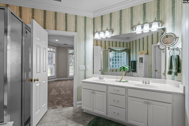 132 Magnolia Key Dr, Chapin, SC 29036 - full bathroom with wallpapered walls, double vanity, ornamental molding, tile patterned floors, and baseboards