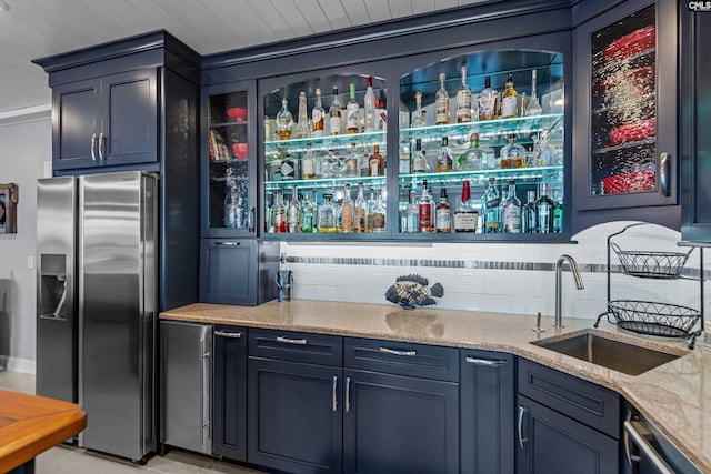 132 Magnolia Key Dr, Chapin, SC 29036 - indoor wet bar with stainless steel appliances and decorative backsplash
