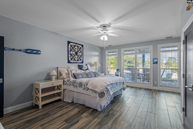 132 Magnolia Key Dr, Chapin, SC 29036 - bedroom with dark wood-style floors, access to outside, baseboards, and a ceiling fan