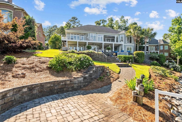 132 Magnolia Key Dr, Chapin, SC 29036 - back of property with stairway, a balcony, a yard, and covered porch