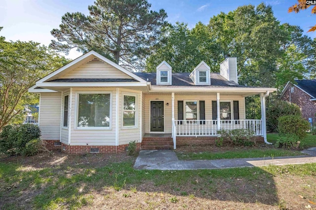 220 Colchester Dr, Columbia, SC 29223 - view of front facade with a porch, crawl space, and a chimney