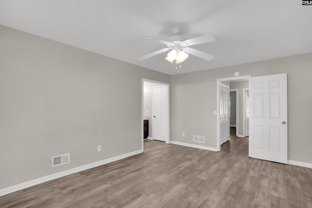 220 Colchester Dr, Columbia, SC 29223 - unfurnished bedroom featuring baseboards, wood finished floors, and ceiling fan