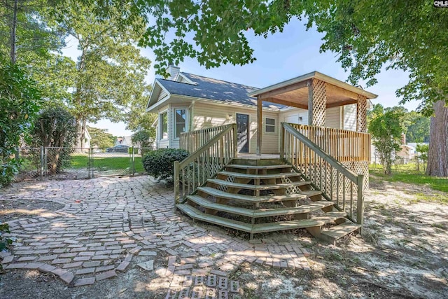 220 Colchester Dr, Columbia, SC 29223 - view of front facade with stairway, a gate, and a chimney