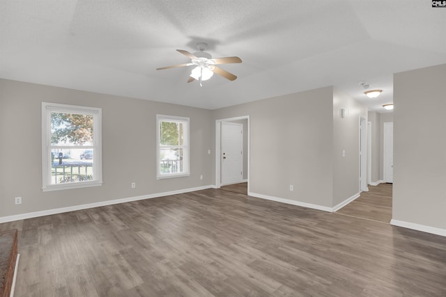 220 Colchester Dr, Columbia, SC 29223 - spare room with a ceiling fan, dark wood-type flooring, and baseboards