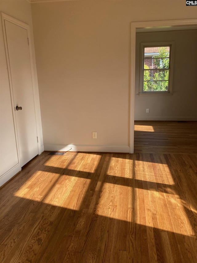 4101 Ridgewood Ave, Columbia, SC 29203 - empty room with wood finished floors and baseboards
