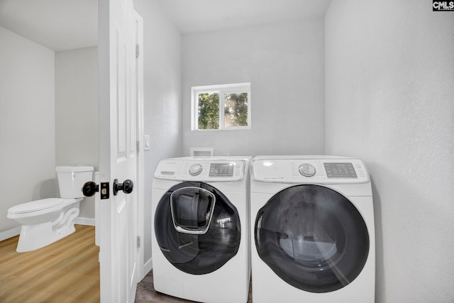 3509 Baywater Dr, Columbia, SC 29209 - washroom featuring washer and clothes dryer, wood finished floors, and baseboards