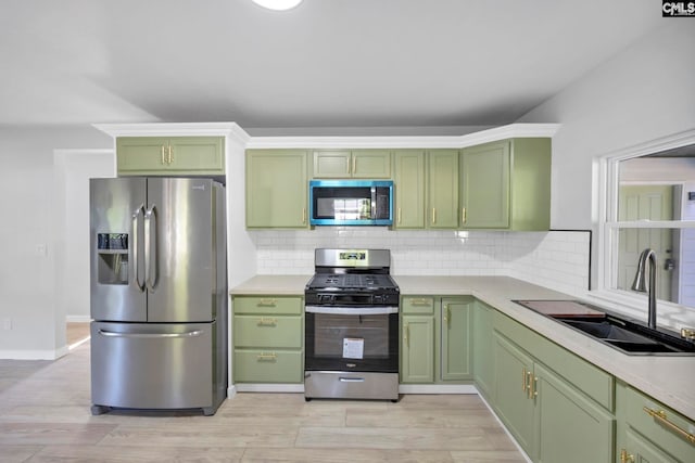 3509 Baywater Dr, Columbia, SC 29209 - kitchen featuring green cabinetry, stainless steel appliances, a sink, and light countertops