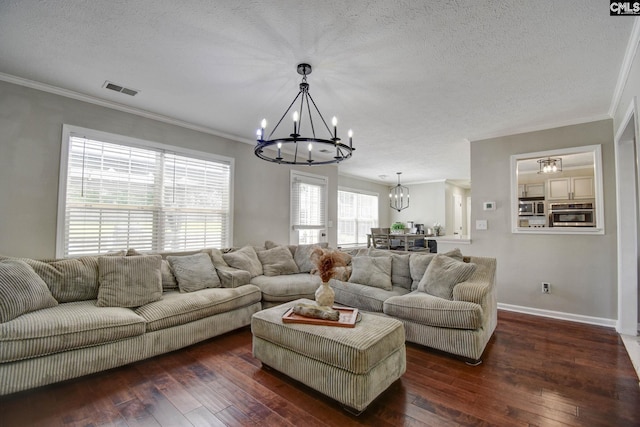 113 Dutch Oaks Dr, Irmo, SC 29063 - living area featuring a chandelier, dark wood-style floors, crown molding, a textured ceiling, and baseboards