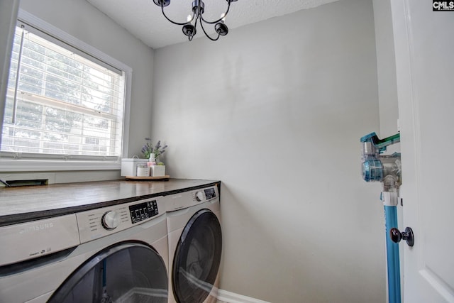 113 Dutch Oaks Dr, Irmo, SC 29063 - laundry area with independent washer and dryer, a chandelier, baseboards, and a textured ceiling