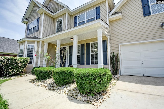 113 Dutch Oaks Dr, Irmo, SC 29063 - entrance to property featuring an attached garage and a porch