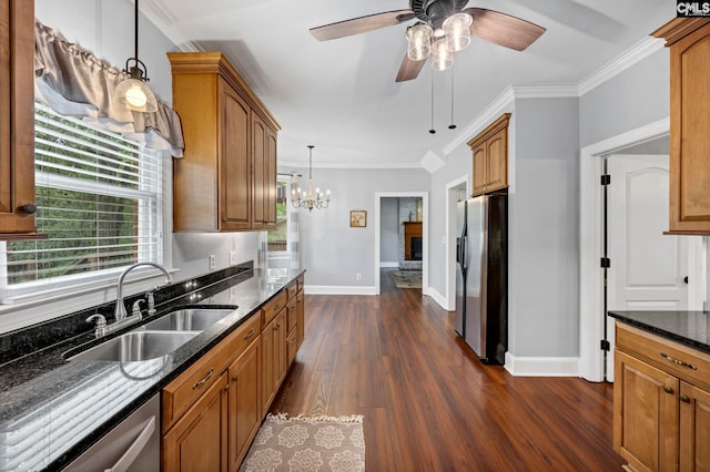 101 Stephenson Ln, Columbia, SC 29212 - kitchen with appliances with stainless steel finishes, a sink, dark wood-style flooring, ceiling fan, and dark stone counters