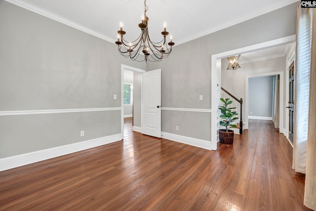 101 Stephenson Ln, Columbia, SC 29212 - unfurnished room featuring a chandelier, stairway, wood finished floors, baseboards, and crown molding