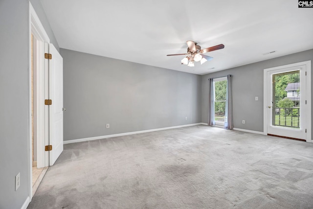 101 Stephenson Ln, Columbia, SC 29212 - carpeted empty room with baseboards and a ceiling fan