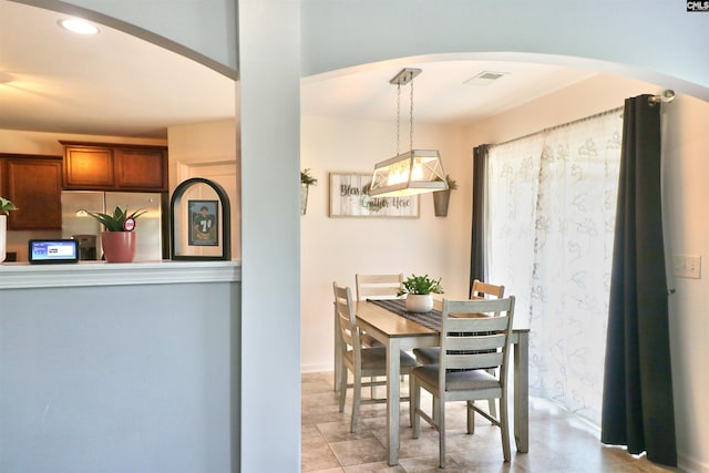 542 Pineberry Ct, West Columbia, SC 29170 - dining area with arched walkways and recessed lighting