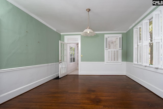 111 Southwood Dr, Columbia, SC 29205 - unfurnished dining area with wood finished floors, ornamental molding, and a wainscoted wall