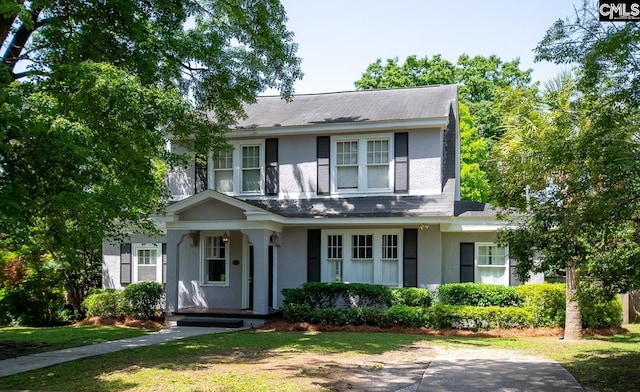 111 Southwood Dr, Columbia, SC 29205 - view of front of home with covered porch, stucco siding, and roof with shingles