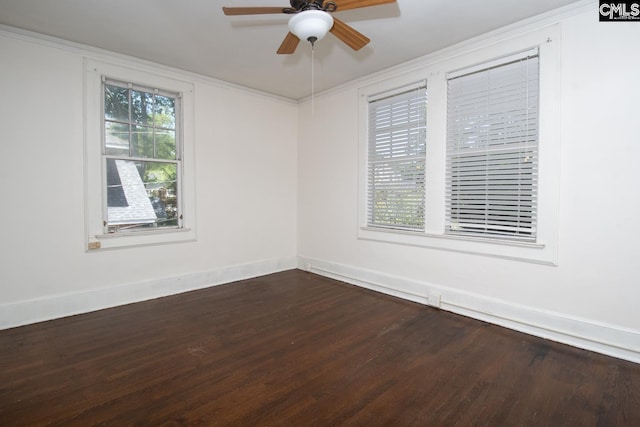 111 Southwood Dr, Columbia, SC 29205 - spare room featuring ceiling fan, dark wood-style floors, crown molding, and baseboards