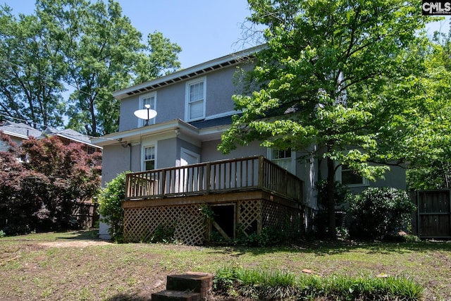 111 Southwood Dr, Columbia, SC 29205 - rear view of property featuring stucco siding and a wooden deck