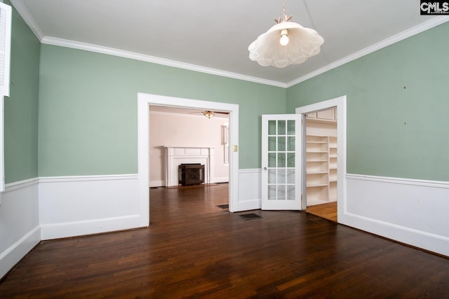 111 Southwood Dr, Columbia, SC 29205 - unfurnished dining area featuring wood finished floors, ornamental molding, a brick fireplace, french doors, and baseboards