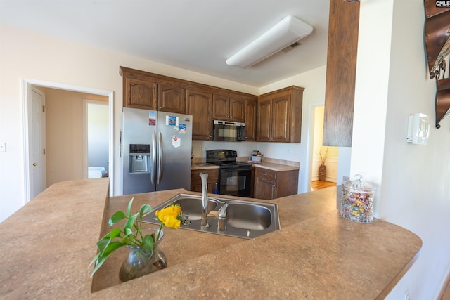 6126 Slab Landing Dr, Cope, SC 29038 - kitchen featuring black appliances and a sink