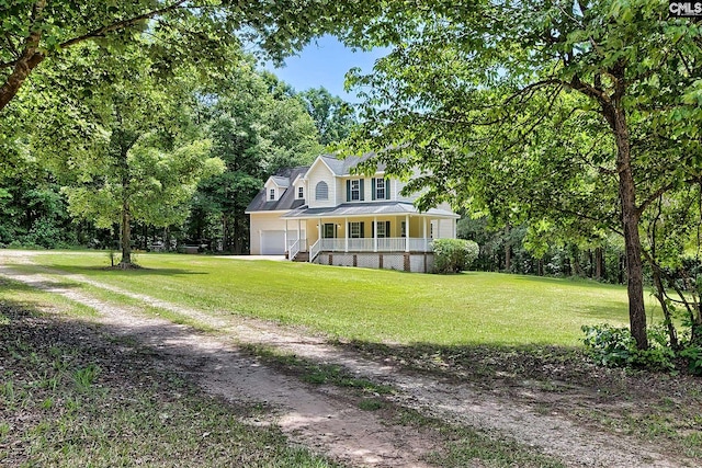 198 Beaver Creek Cir, Lugoff, SC 29078 - view of front of house featuring a porch, a front lawn, and a garage