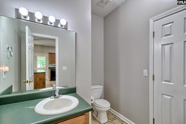 198 Beaver Creek Cir, Lugoff, SC 29078 - bathroom with toilet, vanity, and baseboards