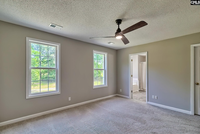 198 Beaver Creek Cir, Lugoff, SC 29078 - unfurnished bedroom with carpet floors, baseboards, a textured ceiling, a ceiling fan, and ensuite bathroom
