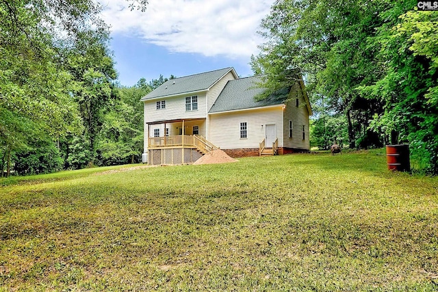 198 Beaver Creek Cir, Lugoff, SC 29078 - back of property with a lawn, a wooden deck, and stairs