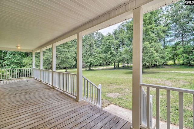 198 Beaver Creek Cir, Lugoff, SC 29078 - porch with a yard and view of wooded area