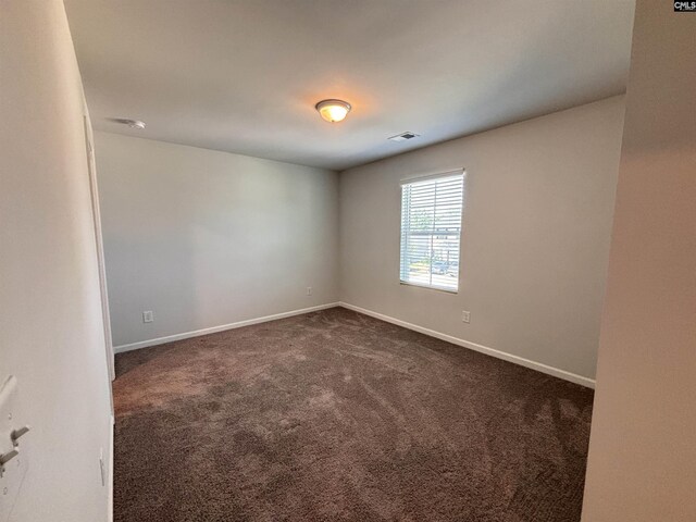 184 Windfall Rd, Blythewood, SC 29016 - spare room with dark colored carpet and baseboards