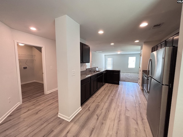 184 Windfall Rd, Blythewood, SC 29016 - kitchen featuring freestanding refrigerator, a sink, baseboards, light wood-type flooring, and recessed lighting