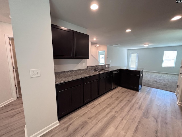 184 Windfall Rd, Blythewood, SC 29016 - kitchen with light stone countertops, light wood-type flooring, baseboards, and recessed lighting