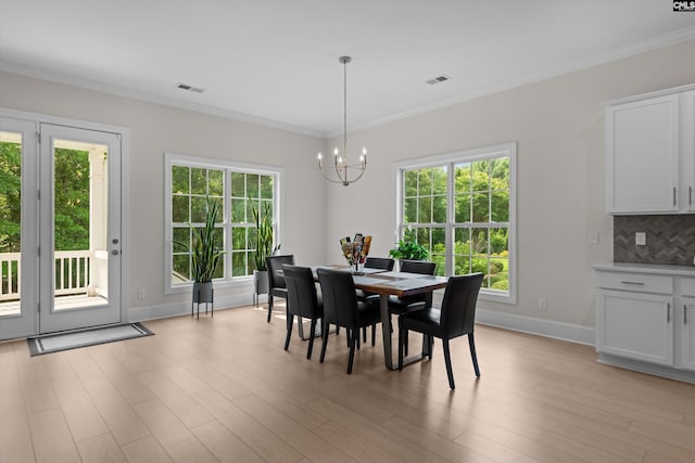 204 Peninsula Way, Columbia, SC 29229 - dining area with a chandelier, baseboards, plenty of natural light, and ornamental molding