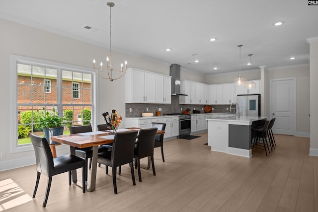 204 Peninsula Way, Columbia, SC 29229 - dining area featuring ornamental molding, a chandelier, light wood-style floors, baseboards, and recessed lighting