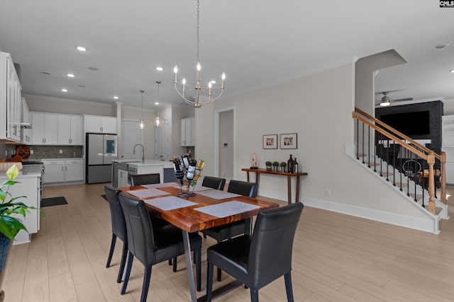 204 Peninsula Way, Columbia, SC 29229 - dining area with stairs, crown molding, a chandelier, recessed lighting, and light wood-type flooring