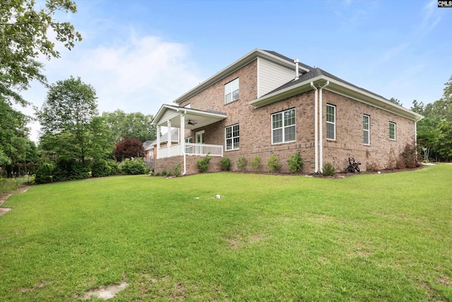 204 Peninsula Way, Columbia, SC 29229 - rear view of house with a ceiling fan, a yard, brick siding, and covered porch