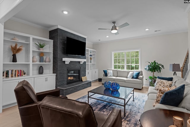 204 Peninsula Way, Columbia, SC 29229 - living area with light wood-style flooring, a ceiling fan, a fireplace, recessed lighting, and crown molding