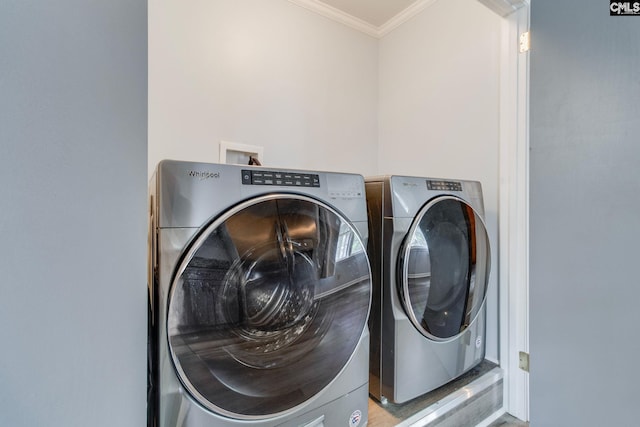 212 Alexandria St, West Columbia, SC 29169 - laundry area featuring ornamental molding and washing machine and dryer