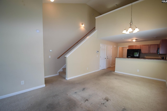 267 Courtside Dr, Lexington, SC 29073 - unfurnished living room with light carpet, stairs, a chandelier, baseboards, and high vaulted ceiling