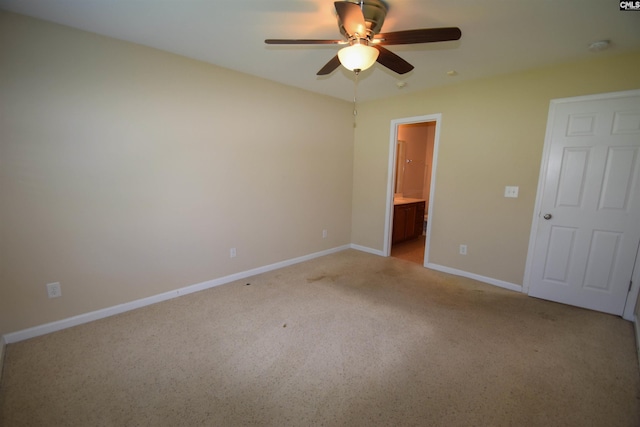 267 Courtside Dr, Lexington, SC 29073 - unfurnished bedroom with light carpet, baseboards, connected bathroom, and a ceiling fan