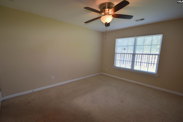 267 Courtside Dr, Lexington, SC 29073 - empty room featuring light carpet, baseboards, and ceiling fan