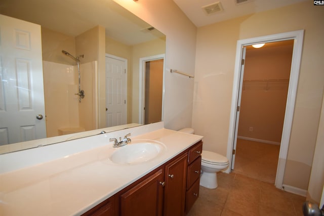 267 Courtside Dr, Lexington, SC 29073 - full bath with toilet, vanity, a shower, tile patterned flooring, and a walk in closet