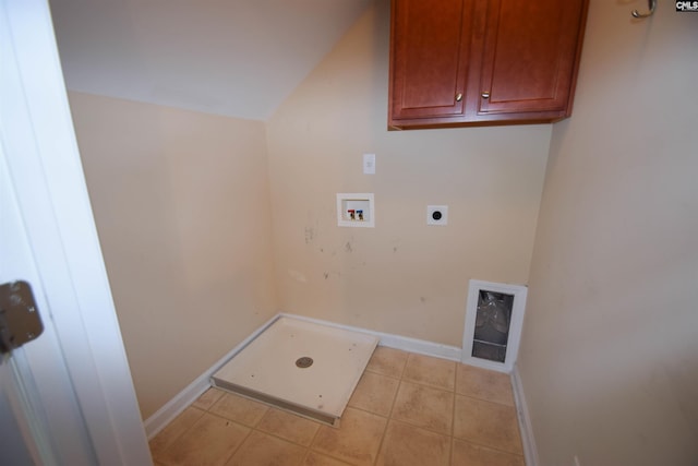 267 Courtside Dr, Lexington, SC 29073 - laundry area with hookup for an electric dryer, washer hookup, cabinet space, baseboards, and light tile patterned flooring