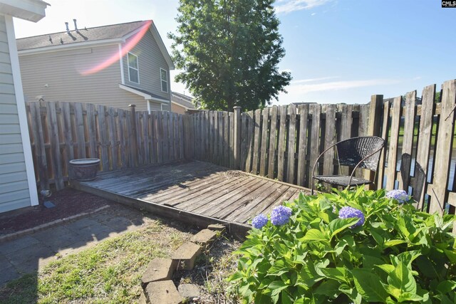 267 Courtside Dr, Lexington, SC 29073 - fenced backyard featuring a wooden deck