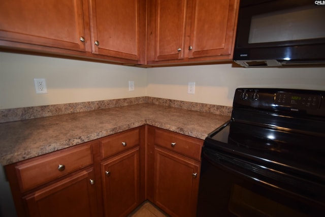 267 Courtside Dr, Lexington, SC 29073 - kitchen with black appliances and brown cabinets