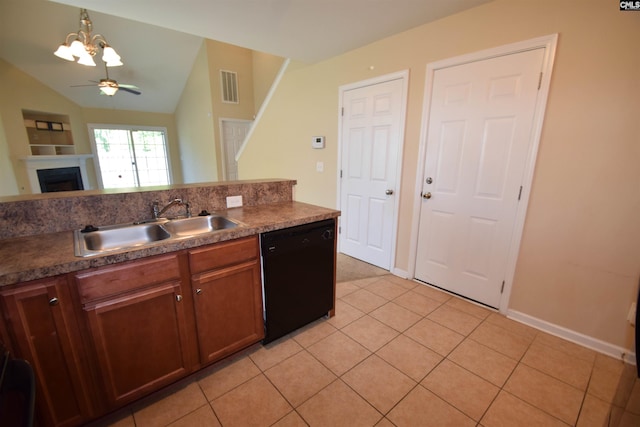 267 Courtside Dr, Lexington, SC 29073 - kitchen featuring dishwasher, a sink, a chandelier, a fireplace, and light tile patterned flooring