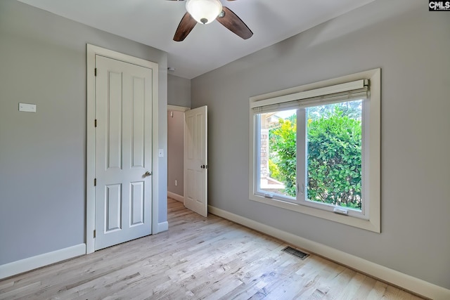 940 Willow Cove Rd, Chapin, SC 29036 - unfurnished bedroom with light wood-style flooring and a ceiling fan