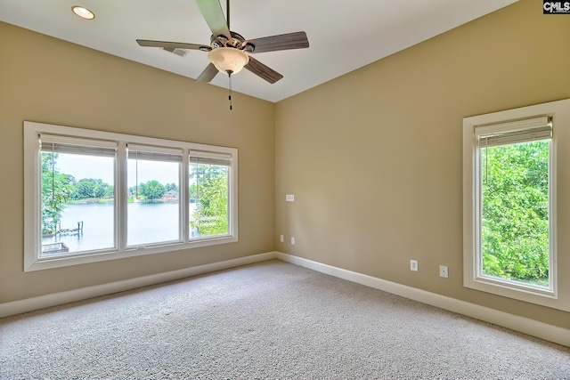 940 Willow Cove Rd, Chapin, SC 29036 - carpeted empty room featuring a ceiling fan, plenty of natural light, a water view, and recessed lighting