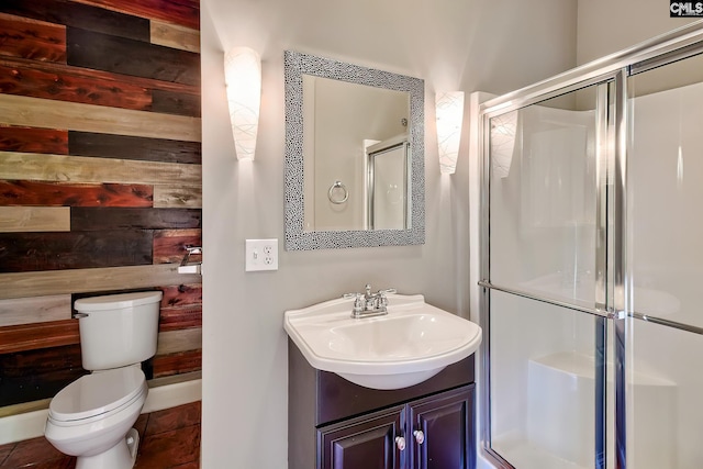 940 Willow Cove Rd, Chapin, SC 29036 - bathroom featuring a stall shower, vanity, wooden walls, and tile patterned flooring