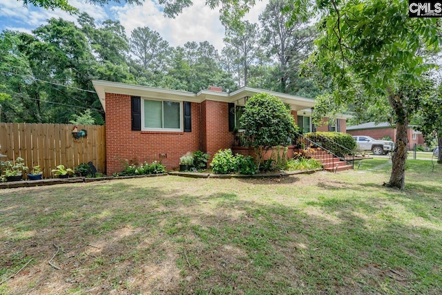 26 Carroll Ct, West Columbia, SC 29170 - ranch-style house with brick siding and a chimney